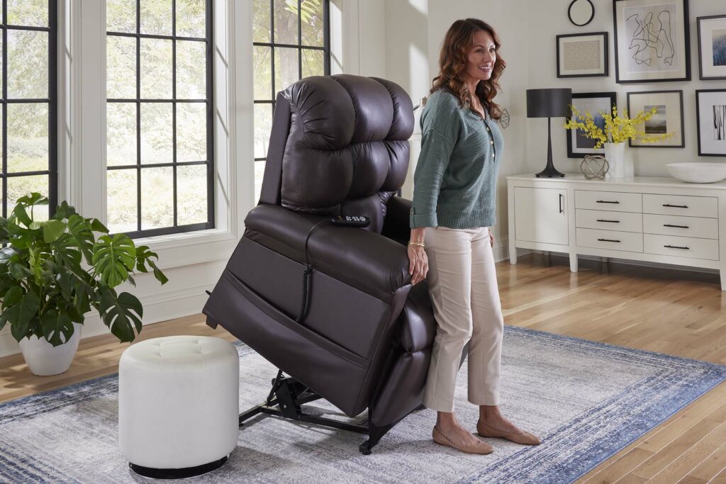 Golden Cloud lift chair in Coffee Bean lifting a woman gently to her feet
